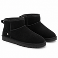 A pair of black suede ankle boots with black faux-leather trim and thick black soles, shown on a clean white background.